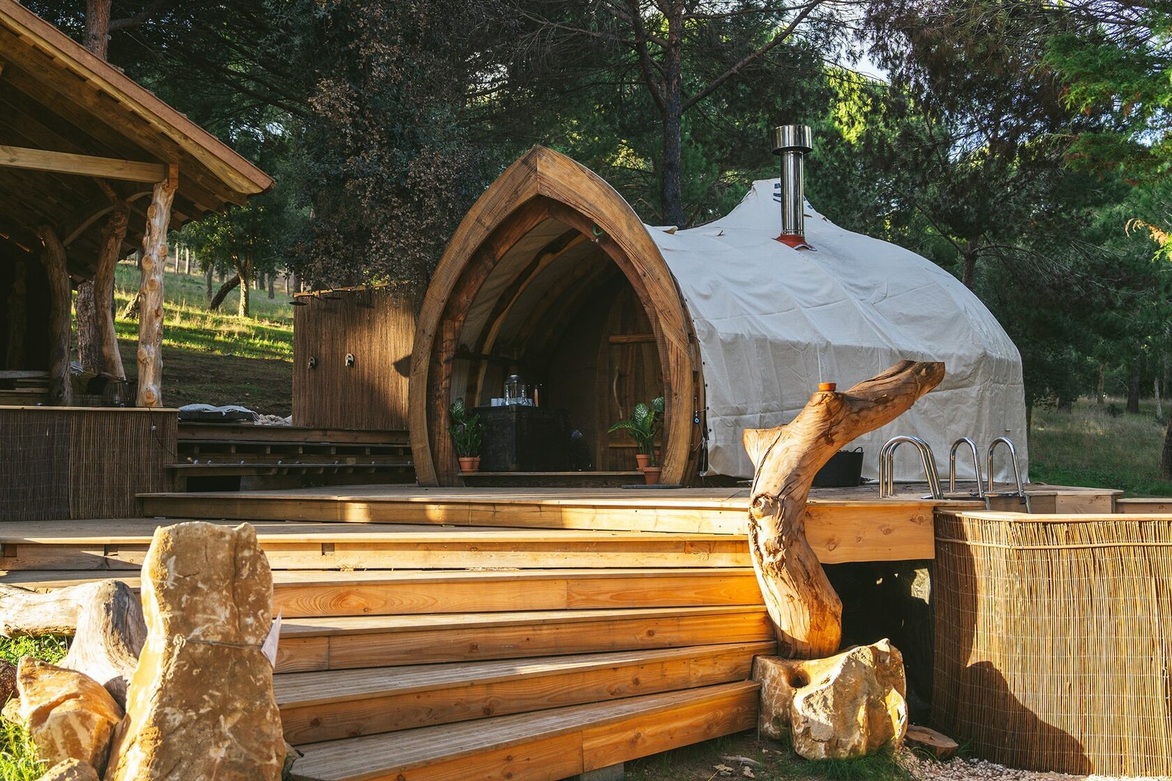 The ATMOS steam dome and timber terrace in a pine forest